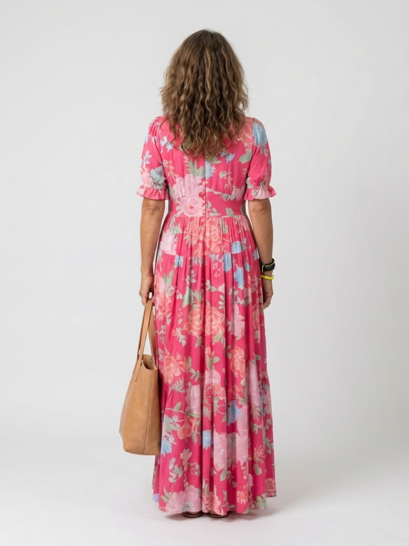 Ione | Vestido midi sin mangas con estampado floral y escote en V