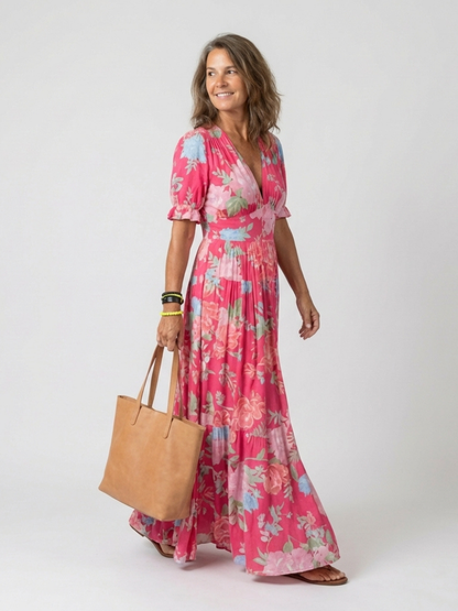 Ione | Vestido midi sin mangas con estampado floral y escote en V