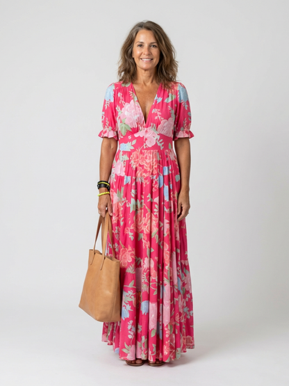 Ione | Vestido midi sin mangas con estampado floral y escote en V