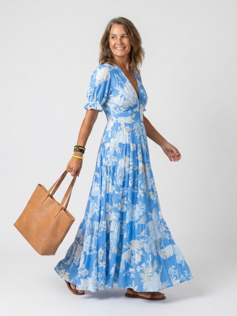 Ione | Vestido midi sin mangas con estampado floral y escote en V