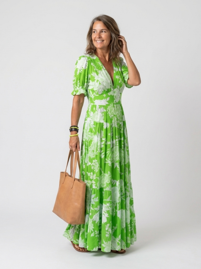 Ione | Vestido midi sin mangas con estampado floral y escote en V